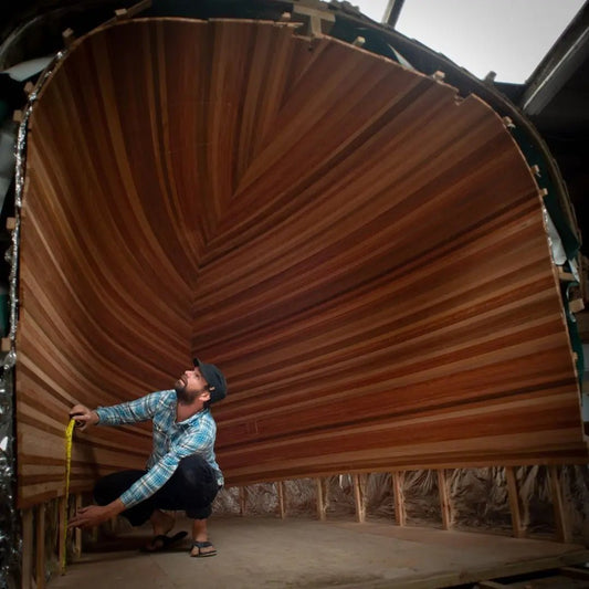 Striking Finnish sauna build into an upturned boat underway in Pembrokeshire - Finnmark Sauna