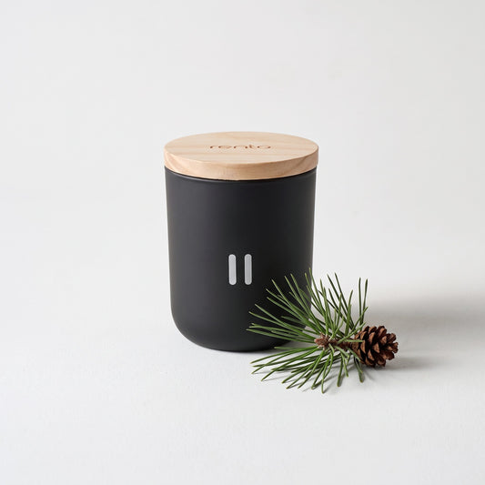 Rento Arctic Pine Scented Candle with pine sprig and cone
