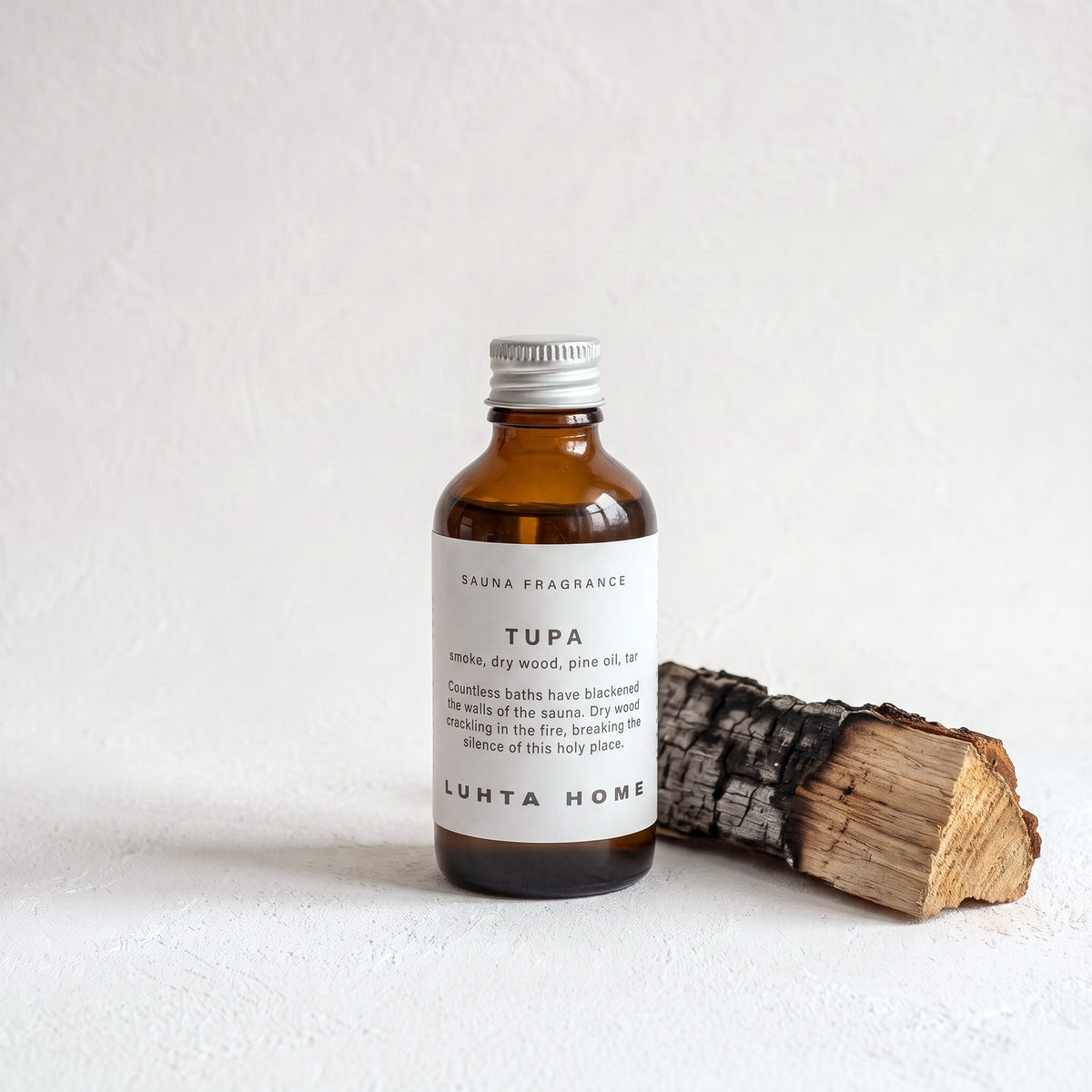 Luhta Tupa Sauna Oil Drops with charred dry wood