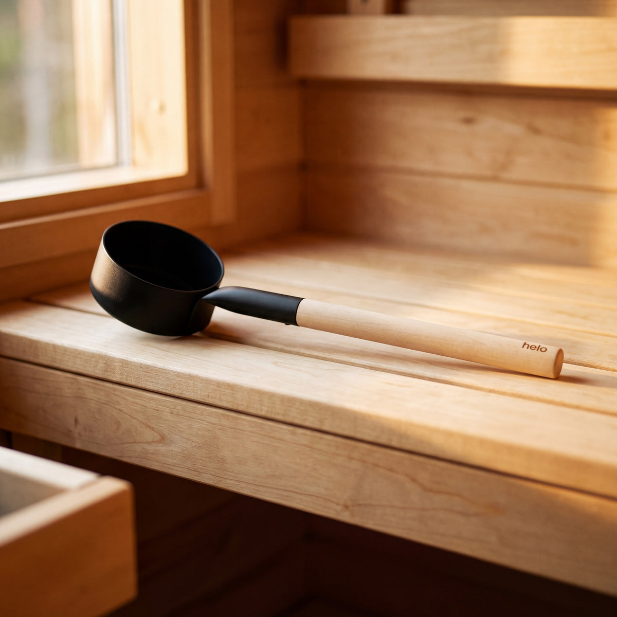 Black Anodised Aluminium Sauna Ladle (Brilliant Range) by Helo - in the sauna