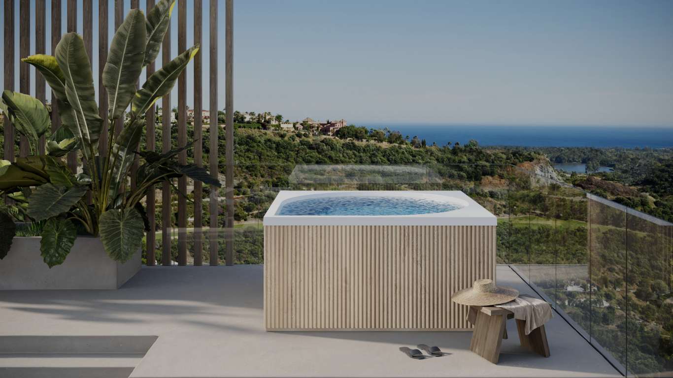Outdoor hot tub with ocean view on a sunny day