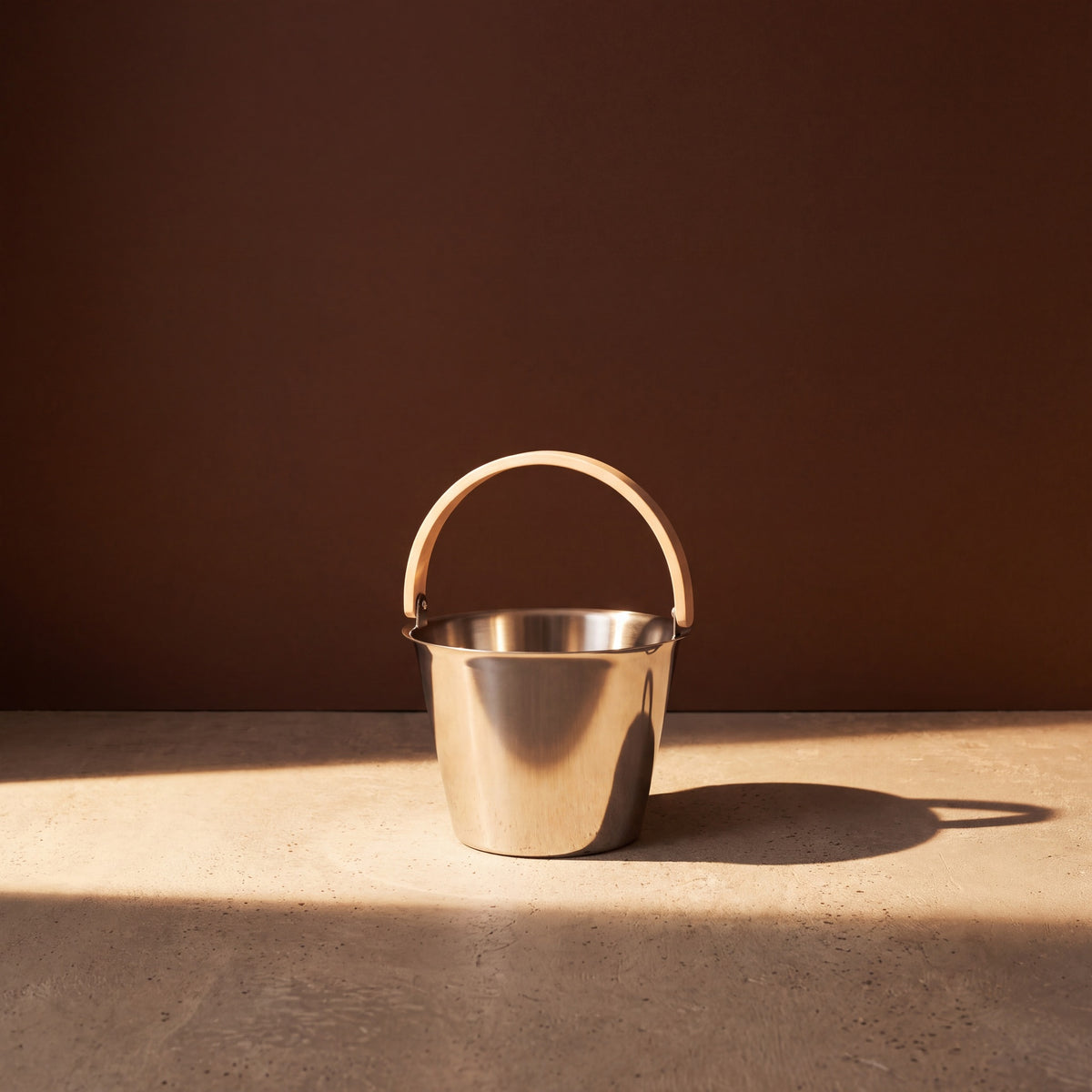 Rento x Harri Koskinen Glossy Steel Sauna Pail - lifestyle in sunlight