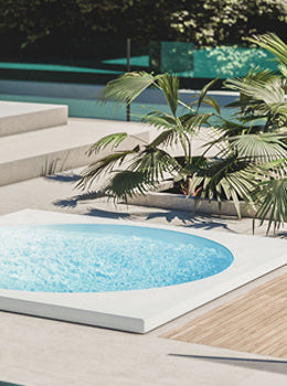 Modern pool with palm trees and a lounge chair in a garden setting