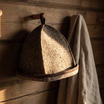 Emendo Felt Sauna Hat Brown - hanging on a sauna peg