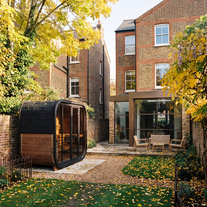 Ralva Large rounded outdoor sauna sited in the corner of a period townhouse garden