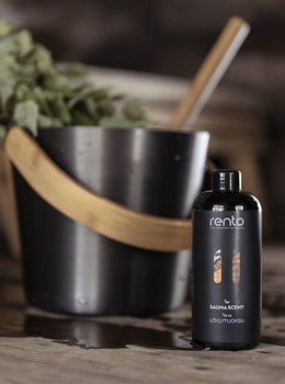 Renbo bottle of cologne with a potted plant in the background