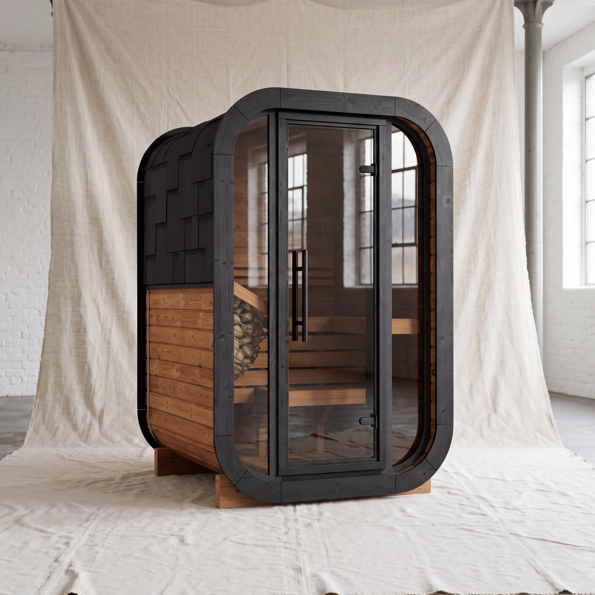 Ralva Small rounded outdoor sauna with a full glass front and bitumen shingle roof
