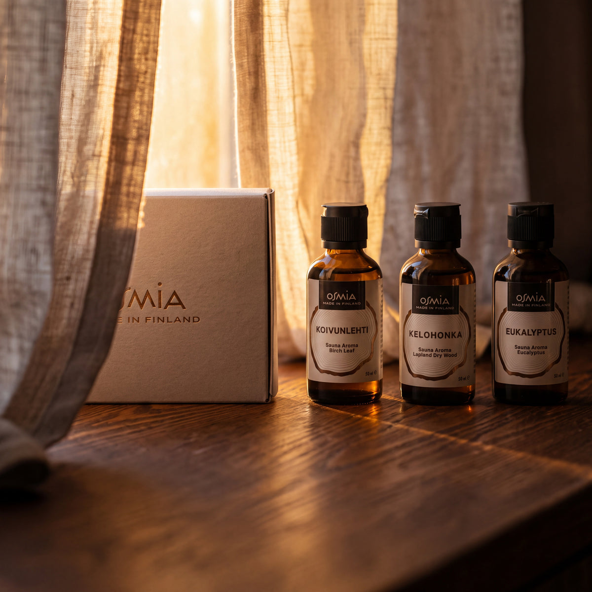 Osmia Classics Sauna Aroma Box - lifestyle by linen curtain