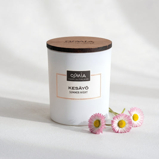 Summer Night Scented Candle by Osmia with pink daisies