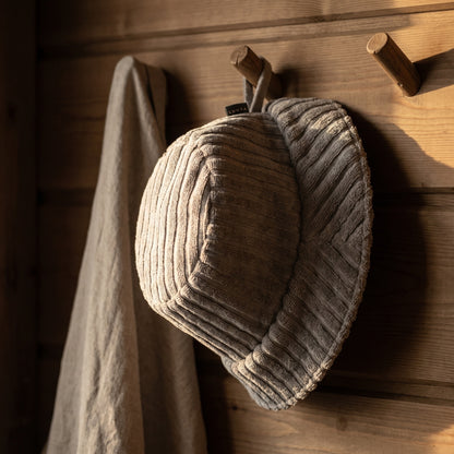 Luhta Aalto Sauna Bucket Hat - hanging on a sauna peg