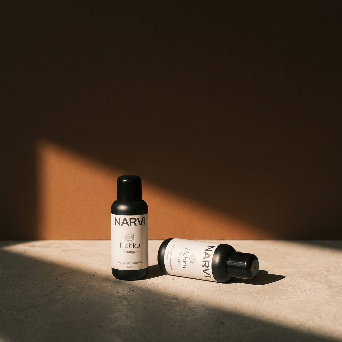 Orange Sauna Scent by Narvi (100ml) - lifestyle in sunlight