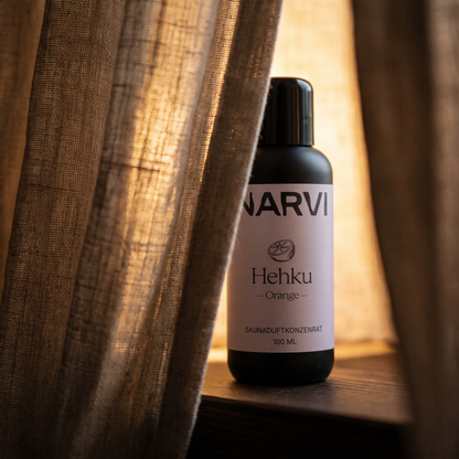 Orange Sauna Scent by Narvi (100ml) - lifestyle behind linen curtain