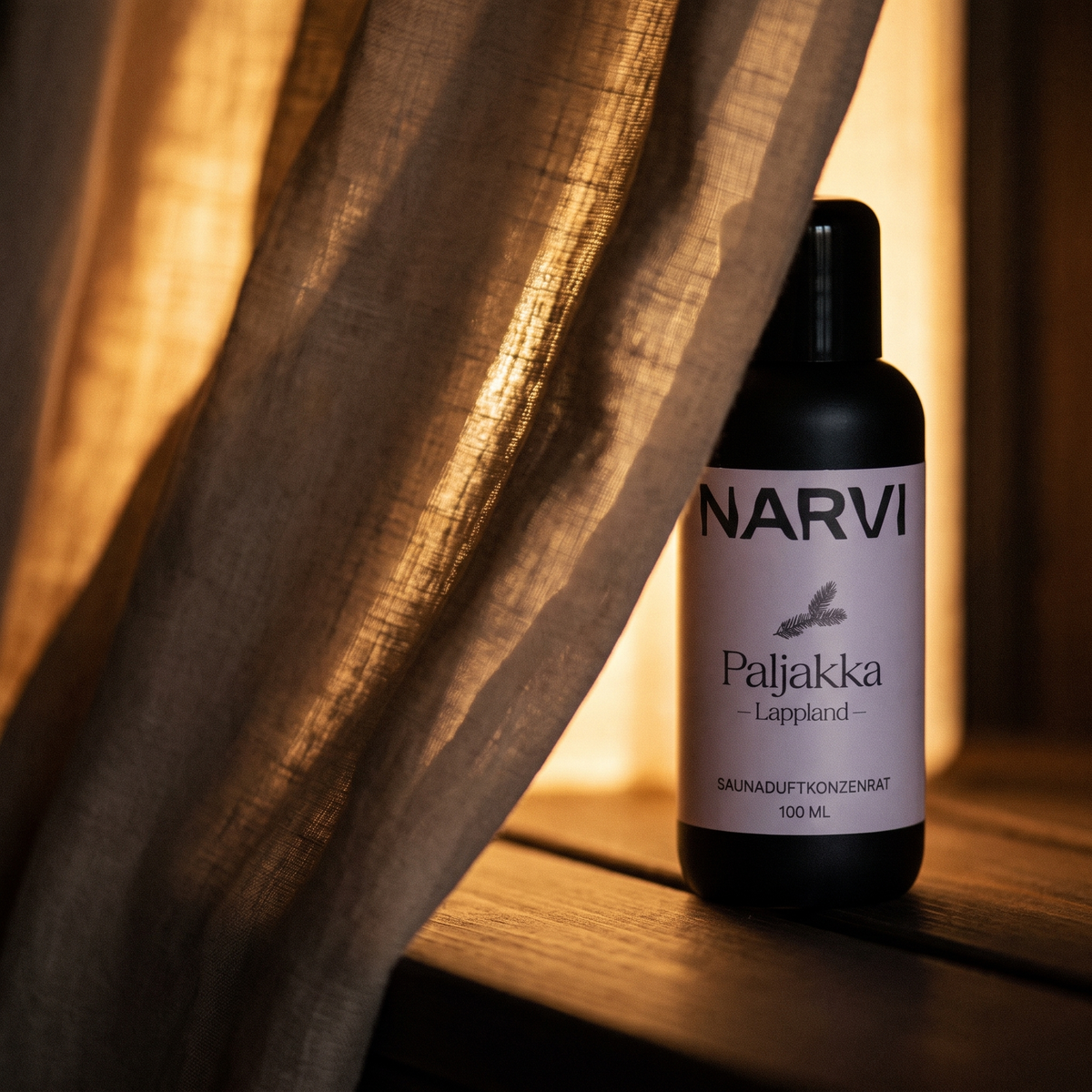 Lapland Sauna Scent by Narvi (100ml) - lifestyle behind linen curtain