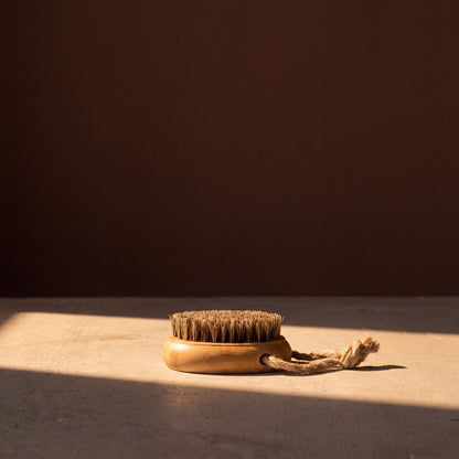 Rento Oval Wooden Nail Brush Bamboo & Natural Hair - lifestyle in sunlight
